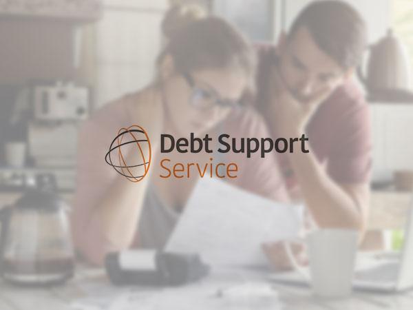 Debt Support Service website shown on a laptop